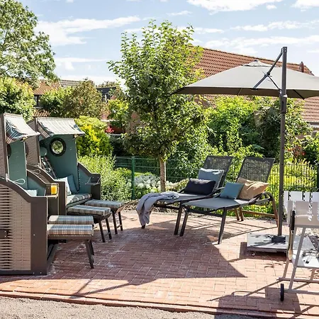 Auszeithaus Pilsum - Wintergarten, Sauna, E-ladesaule - 8 Personen Holiday home Krummhoern